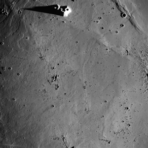 Figure 5. Apollo Metric image (frame ID AS15-M-1156) centered at 25.5 N / 335.2 E, shows the lava-filled Mare Imbrium whose surface is very smooth relative to the lunar highland.