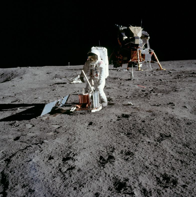 Buzz Aldrin deploying a seismometer in Mare Tranquilitatis during Apollo 11.