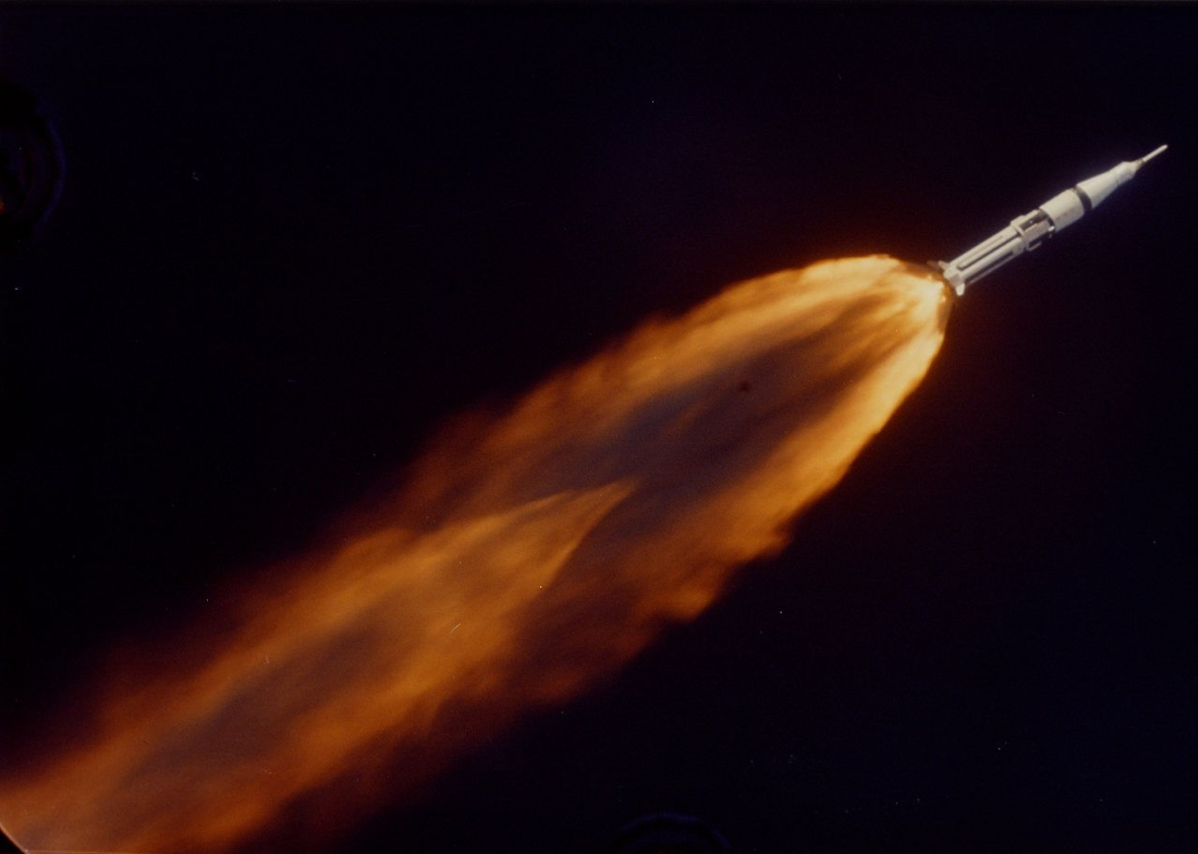image of the apollo 7 Saturn IB rocket climbing toward space