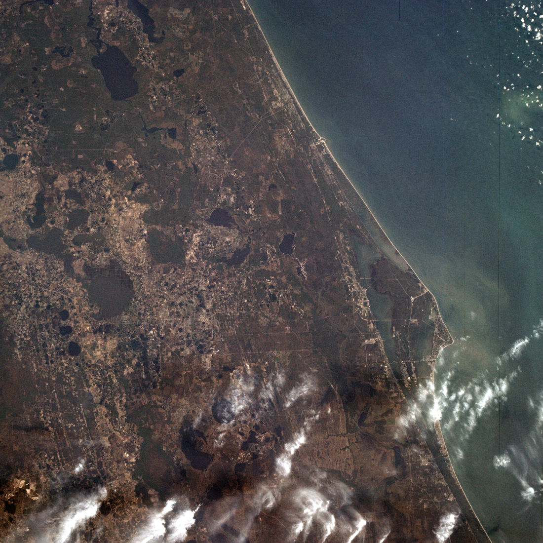 Cape Kennedy and Kennedy Space Center photographed by Apollo 9 astronauts as part of Experiment S065.