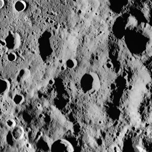Figure 3.  Apollo Metric image (frame ID AS15-M-0464) centered at 23.7 S / 152.3 E  on the farside of the moon, is a fine example of lunar highland terrain. Composed primarily of anorthosite, a light-colored mineral that is less dense than mare basalt, the crust on the farside is significantly thicker than on the nearside.